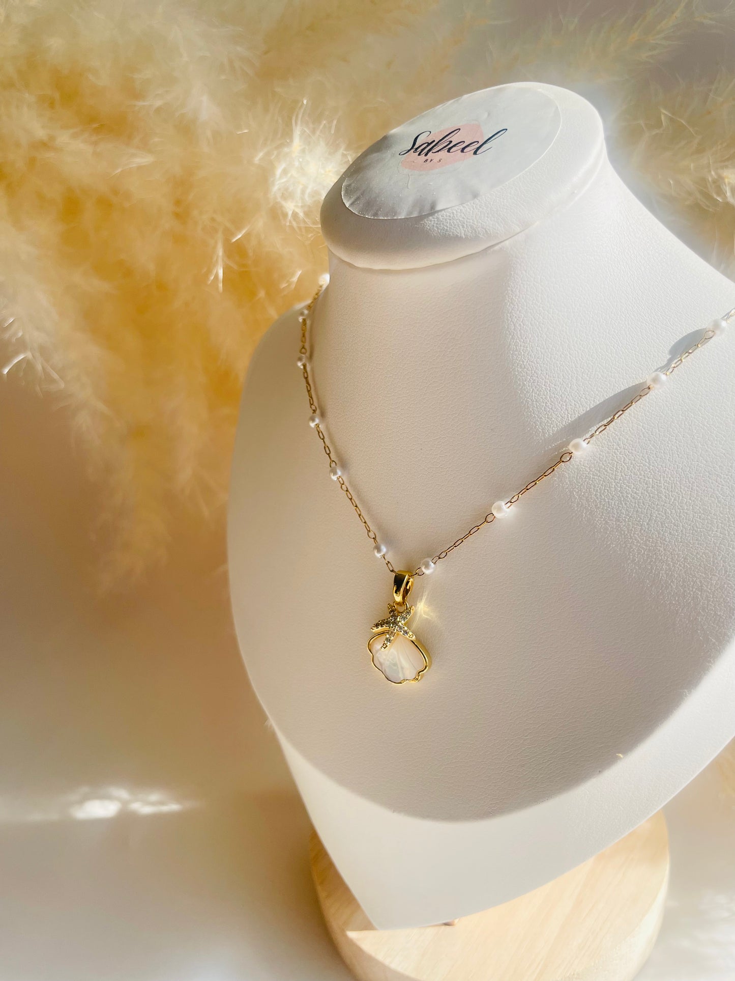 Collier Coquillage perlé