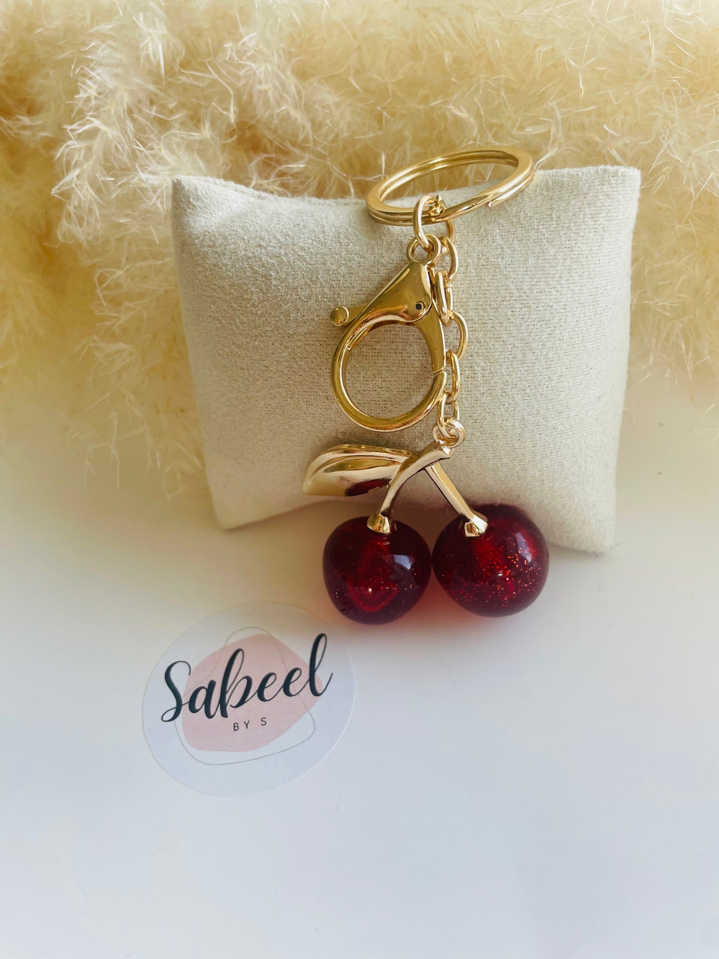 Breloque de Sac Cerise Dorée