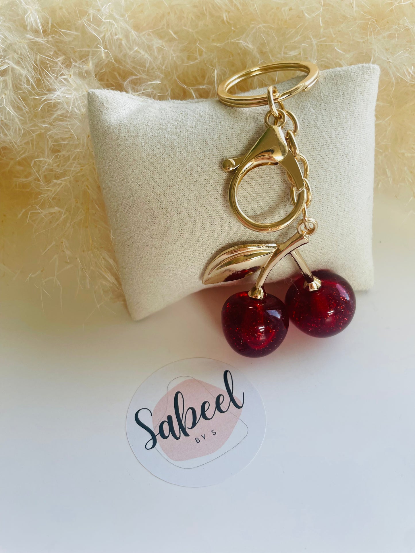 Breloque de Sac Cerise Dorée