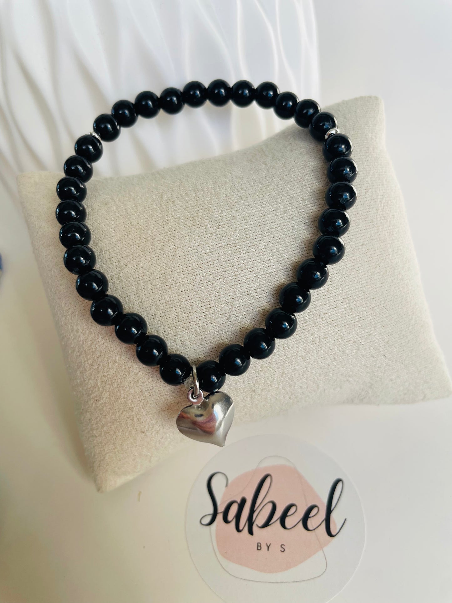 Bracelet Tasbih noir avec breloque cœur argenté